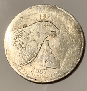 2007-Idaho-State-Quarter-Error-Not-Struck-All-The-Way