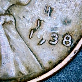 Is-This--1938-Wheat-Cent-Just-Damaged?
