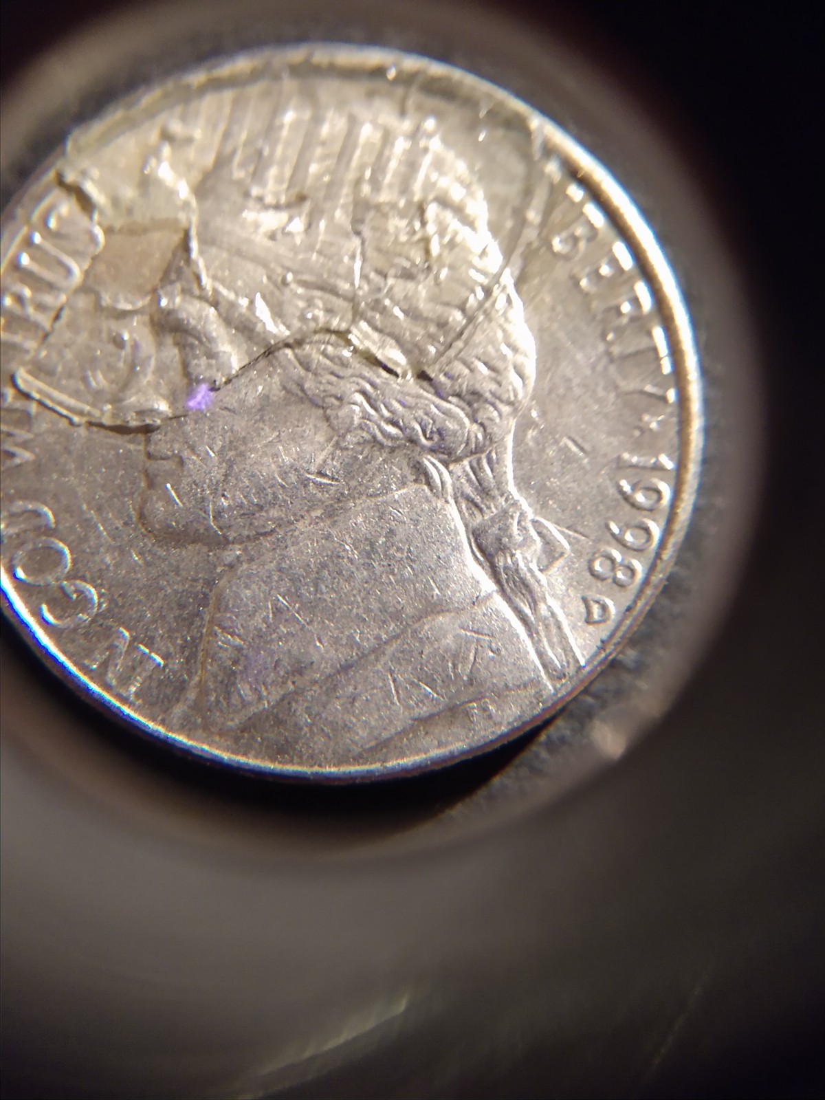 Penny-Struck-Over-1998-D-Nickel?