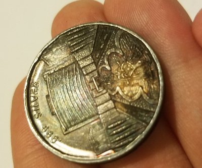 Send-Help.-Found-This-Coin-With-No-Words-Id:-Ceasars-Palace-Silver-Round