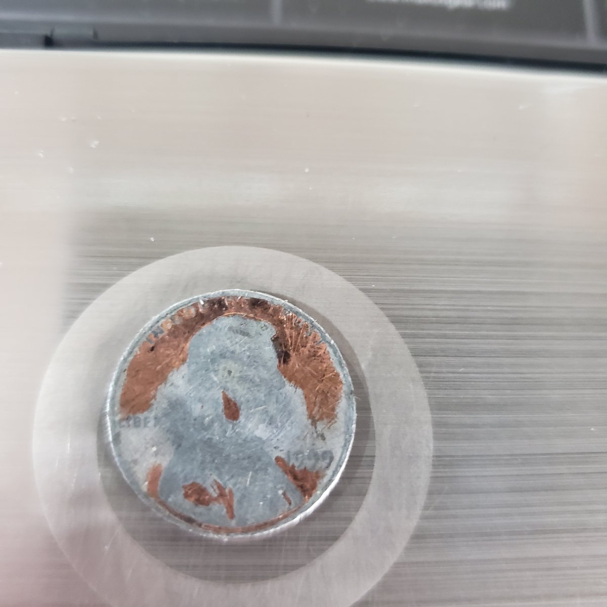 1999-Penny-Partially-Struck-On-A-Dime-Planchet?