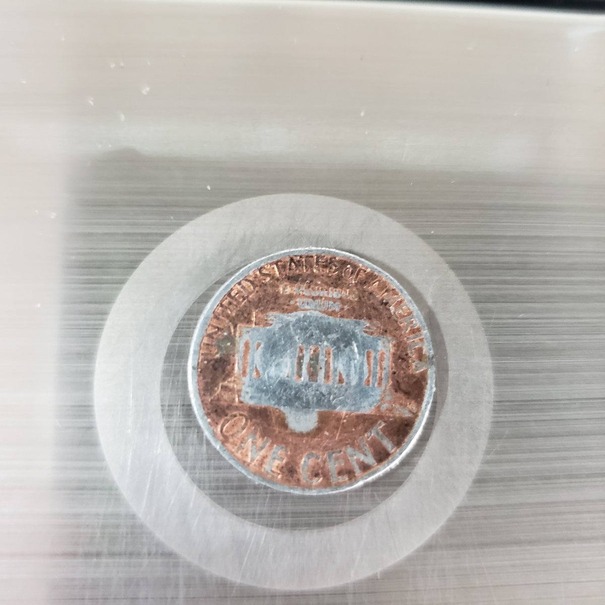 1999-Penny-Partially-Struck-On-A-Dime-Planchet?