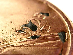 1998-D-Cent-With-Seemingly-Non-Random-Damage