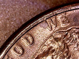 1974-D-LMC,-Lincoln-Sports-An-Earring?