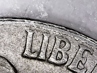 1954-S-Jefferson-Nickel:-Devices-In-Liberty-Are-Crowded