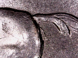 1999-P-Delaware-Quarter,-Spitting-Horse-Kind-Of