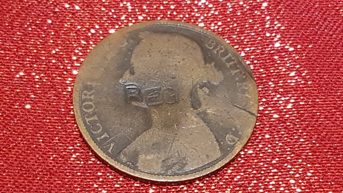 Is-Reg-Engraved-On-A-Coin-Supposed-To-Mean-Or-Stand-For-Something?