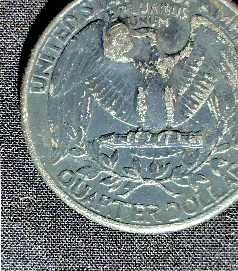 1980-Quarter-With-Two-Bulges-Oppposite-Sides-Not-Dents