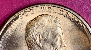 1987-Penny-Clear-Doubling,-But-What's-Up-With-This-Small-Extra-Letter-E?