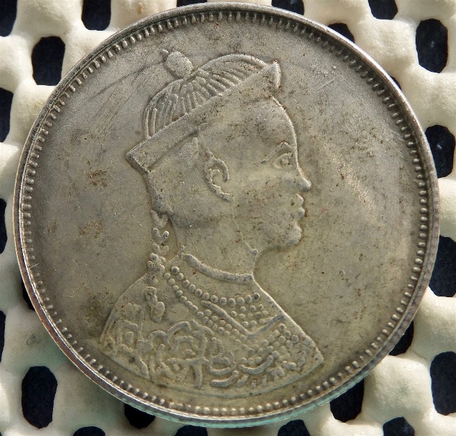Chinese-I-Assume-But-A-Coin-Or-A-Token-?