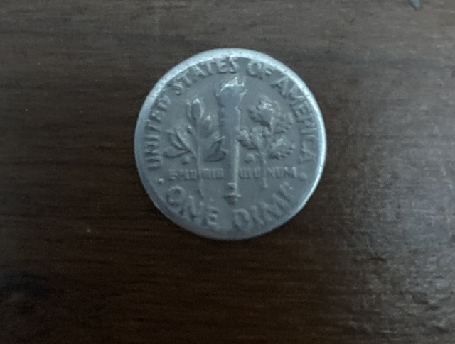 Smushed-Dime-The-Date-Is-From-1900-S-Maybe-1980-S-And-It-Has-The-Letter-D-On-It