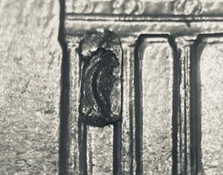 1993-D-LMC-Largest-Die-Chip-Between-The-Columns-On-A-Zinc-Cent-I've-Seen.