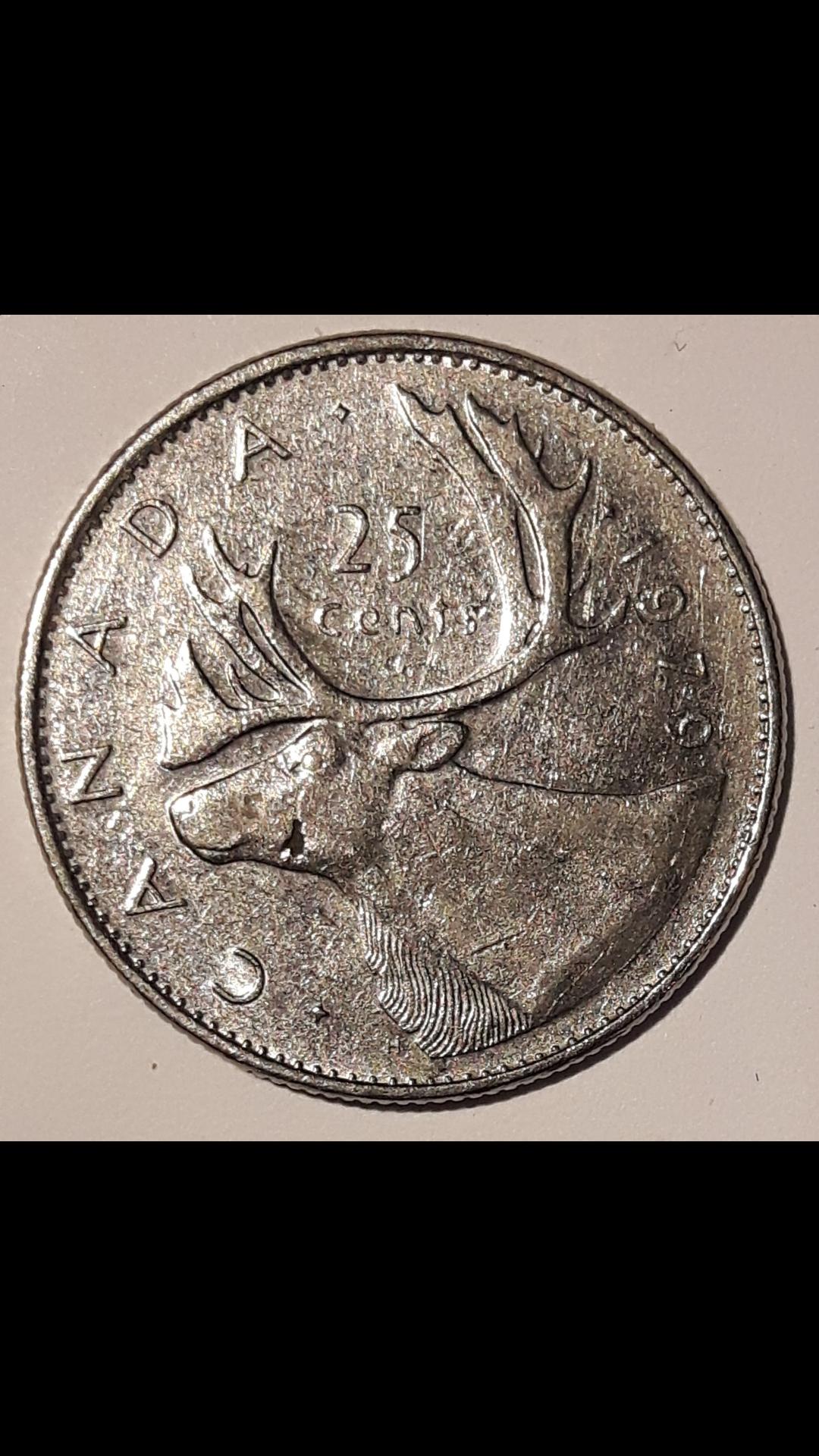 1979-Quarter-Looks-To-Be-A-Rusted-Hole-Or-Crevice-In-The-Moose's-Face