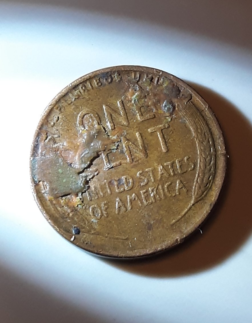 1947-D-Wheat-Penny-W-Damage.-Anyone-Ever-Seen-This-Before