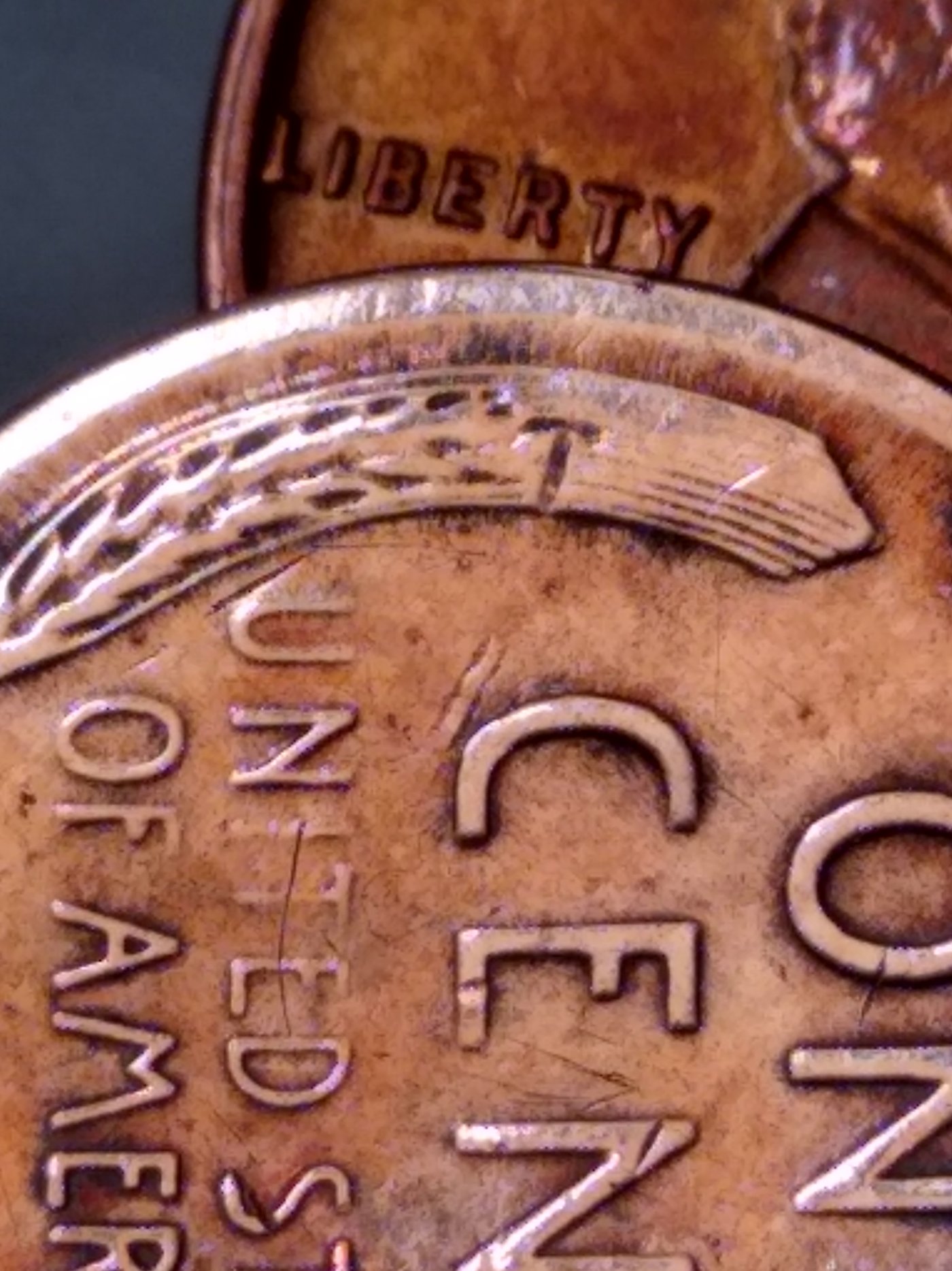 Odd-Marks-On-Lincoln's-Shoulder-On-A-1946-Wheat-Penny
