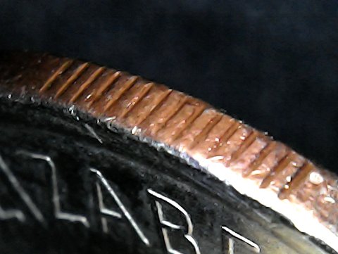 2010-$2-Toonie-With-14-Serrations-And-Uncentered-Core