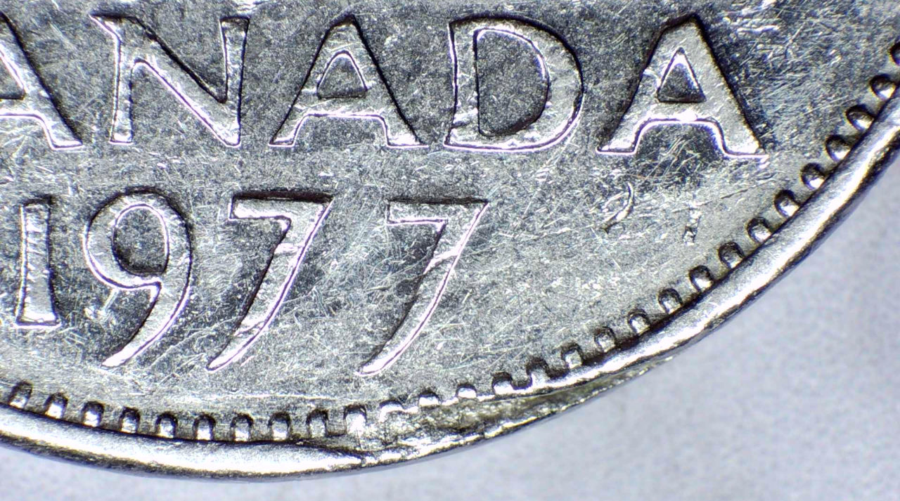 1977-5-Cent,-Strange-Rim-Anomalies..-PMD-Or-Something-Else?