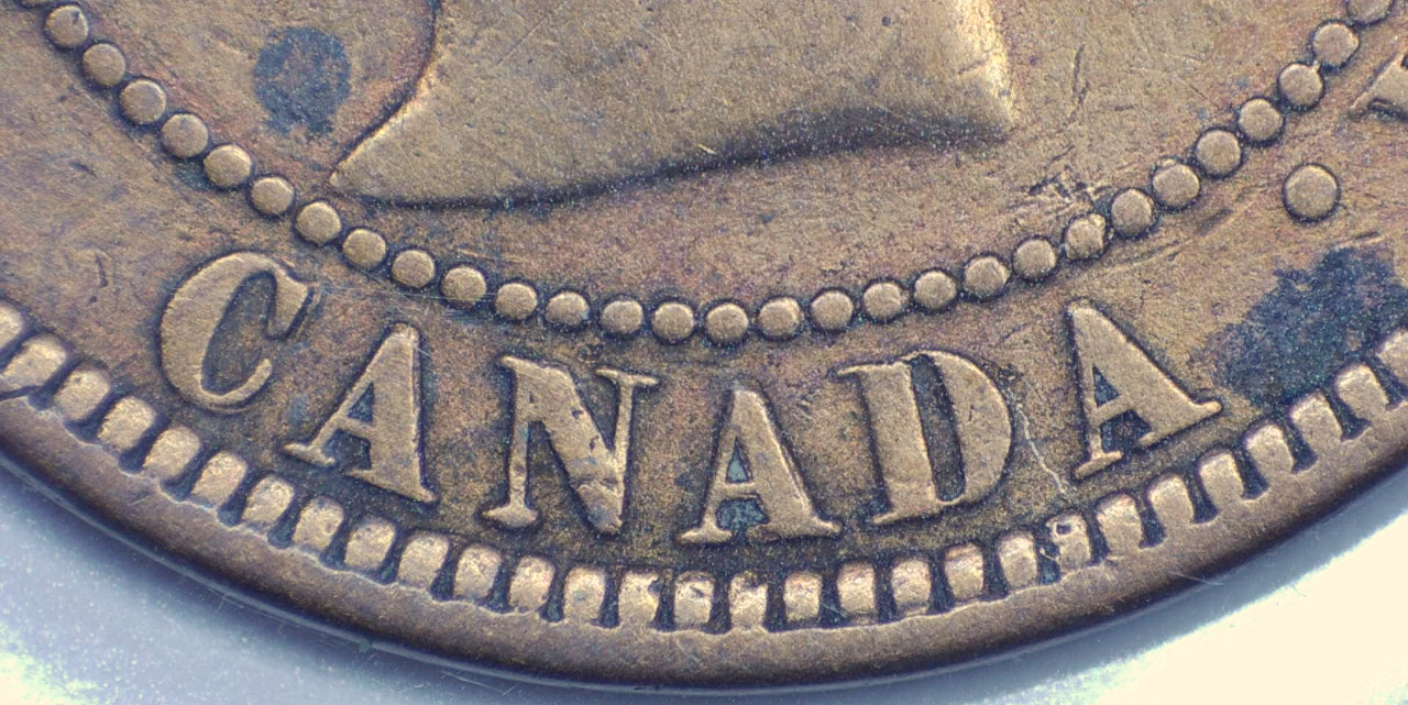 1881-H-Vicky-Cent,-Double/Triple-Re-Punched-Letters-On-Obverse