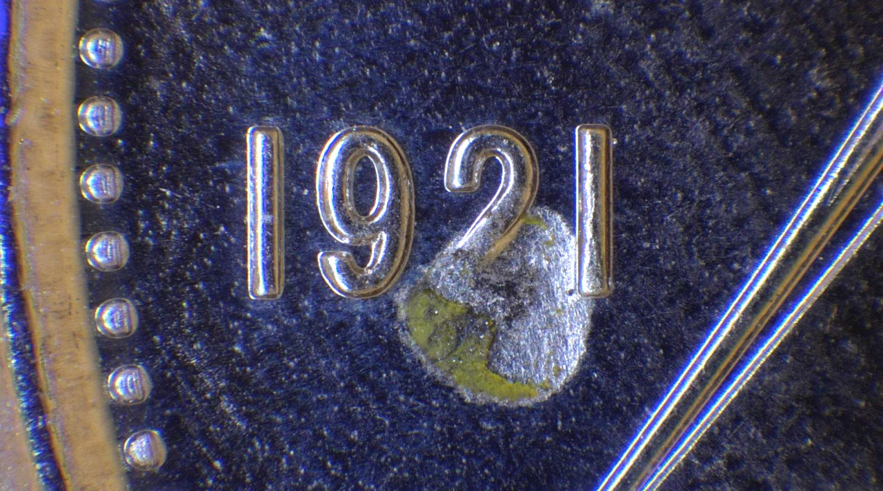 2021-Dual-Dated-Dime,-Struck-Through-Retained-Grease