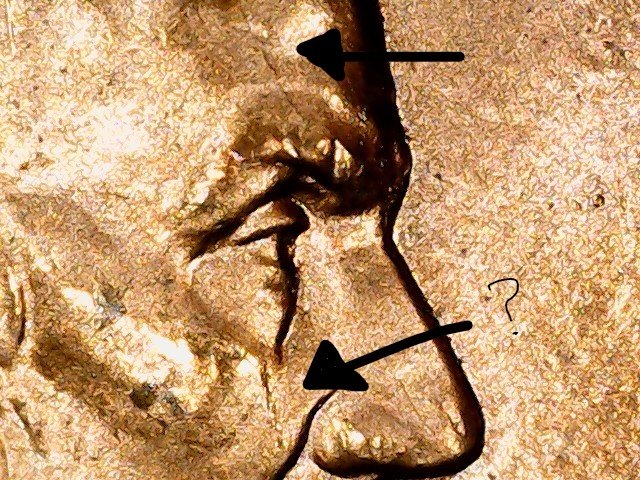 1999-Cracked-Skull-Penny?