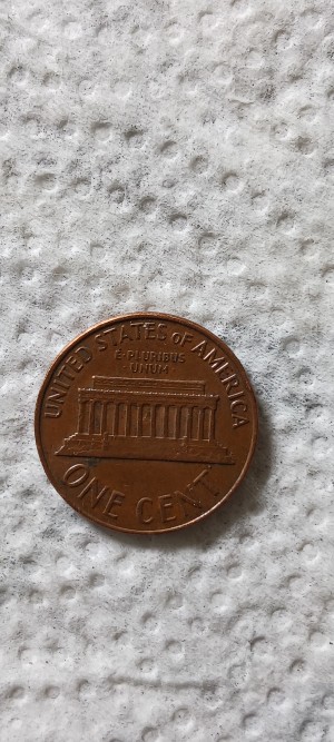 1964-Penny-With-Strange-Date