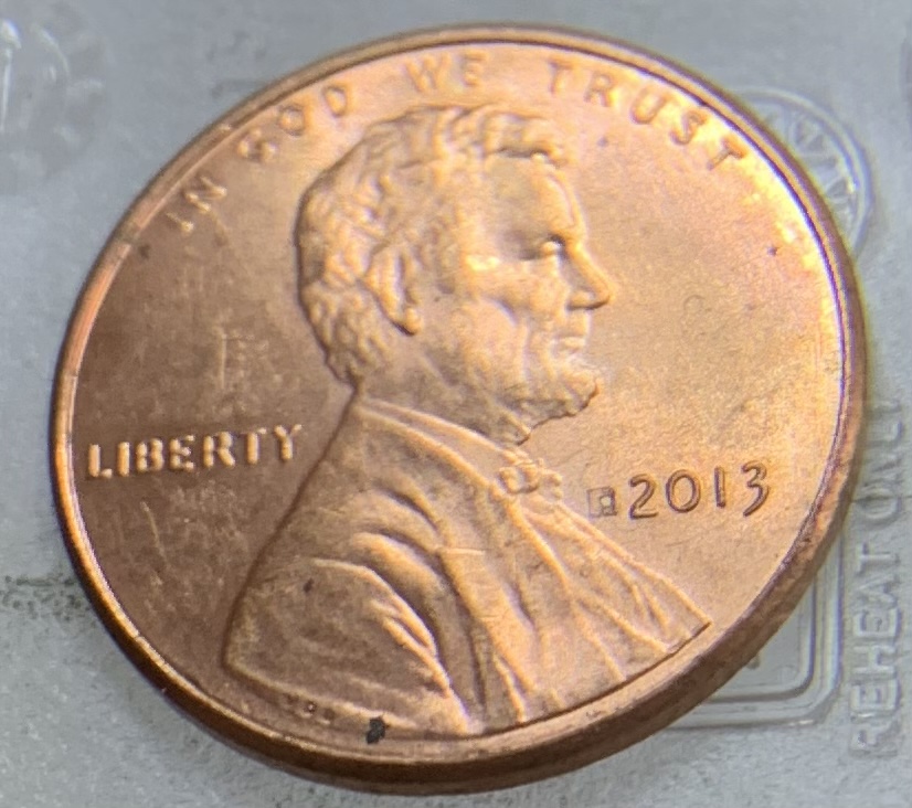 2013-Lincoln-Penny-With-Unusual-Mark-Near-Date