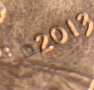 2013-Lincoln-Penny-With-Unusual-Mark-Near-Date