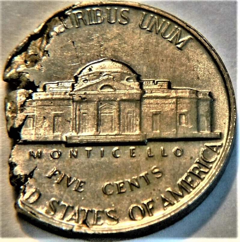 1961-Jefferson-Nickel-Struck-On-A-Defective-Planchet