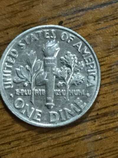 Anything-Strange-On-About-The-Rim-Of-This-2000-Dime?-It-Appears-Off-Center?