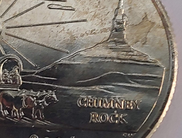 2006-Nebraska-Quarter-Cud-By-Mountain-And-Indentation-Above-2006