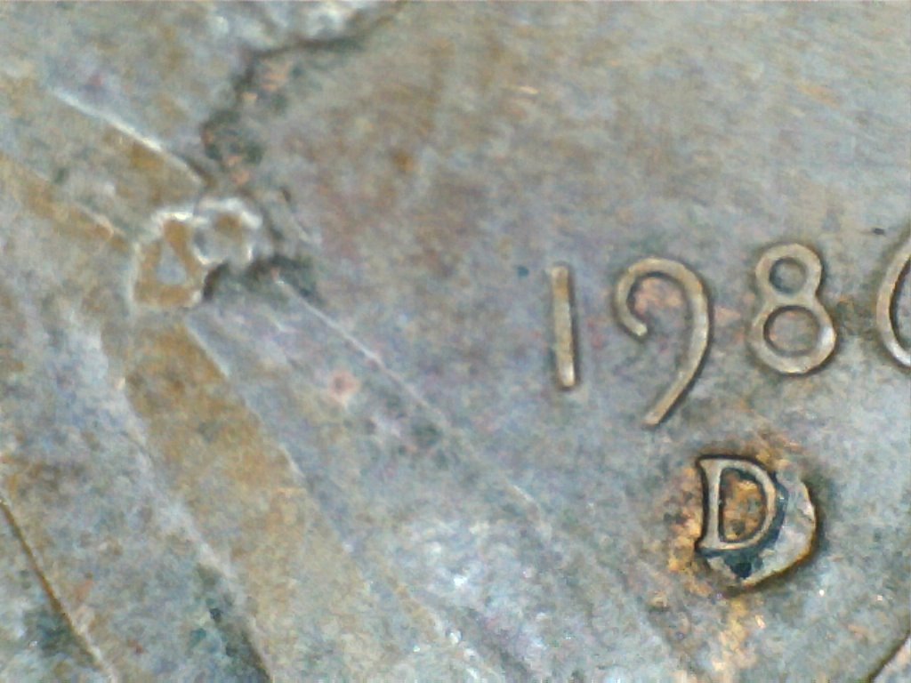 1986-LMC-Die-Chip-Or-Gas-Bubble?