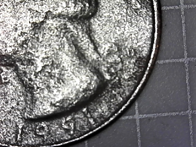 1991-D-Quarter-Damage-Or-Strike-Through-Grease,-Thanks-To-Who-Might-Know.