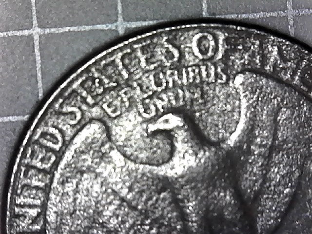 1991-D-Quarter-Damage-Or-Strike-Through-Grease,-Thanks-To-Who-Might-Know.