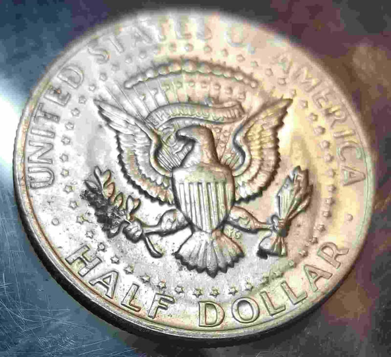 1972-D-Kennedy-Half-Dollar--Wavy~errors?-Mardigras-Eye-Design.