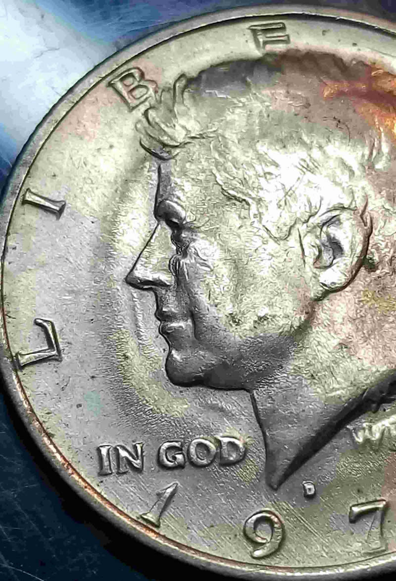 1972-D-Kennedy-Half-Dollar--Wavy~errors?-Mardigras-Eye-Design.