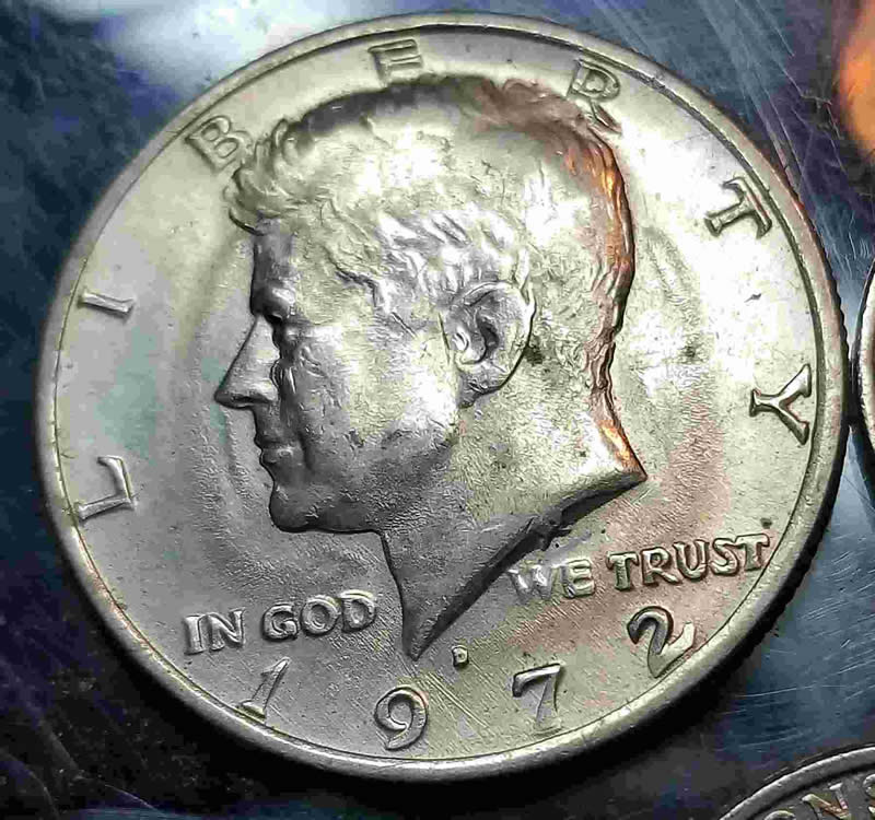 1972-D-Kennedy-Half-Dollar--Wavy~errors?-Mardigras-Eye-Design.