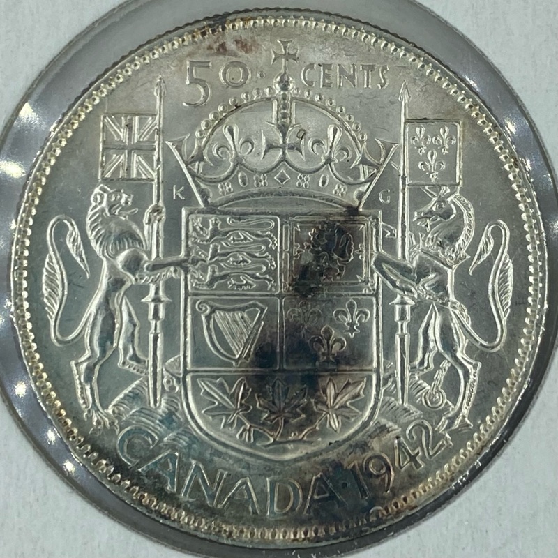 Die-Cracks-On-A-1942-50-Cent-Piece