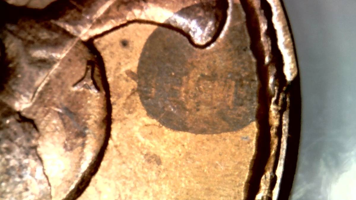 Please-Help-Identify-This-Unknown-Coin-I-Got-From-Bank-Roll-Of-Pennies