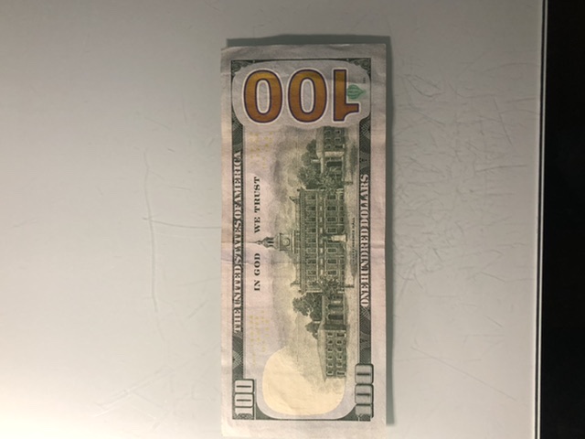100-Dollar-Bill-Reverse-Bottom-Right-Corner-Has-An-Unknown-Print