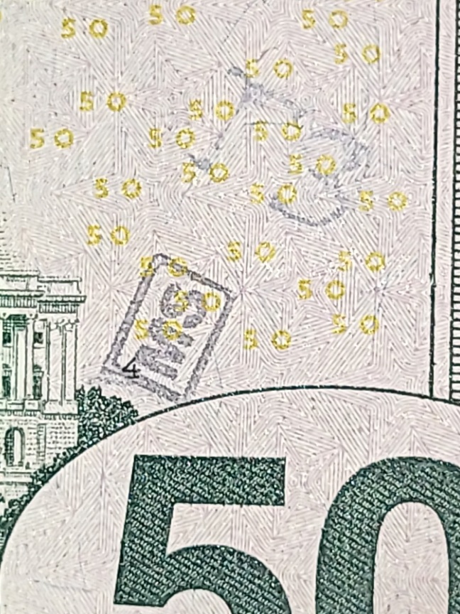 Odd-Markings-On-$50-Note