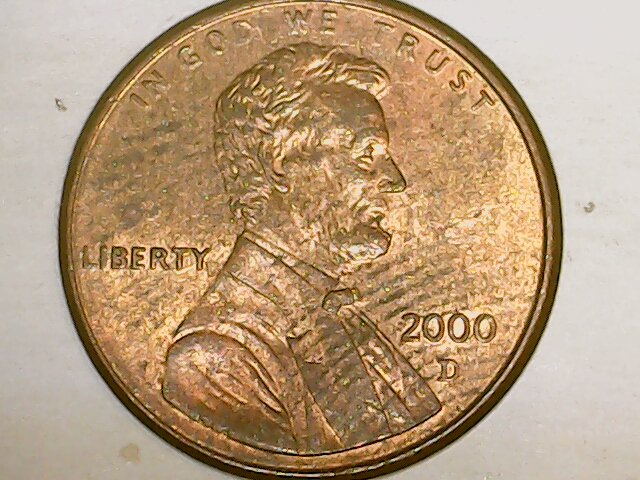 What-Causes-These-Lines-To-Form-On-A-Coin?-And-Why-Do-They-Show-Up-Kinda-Black-To-The-Naked-Eye?