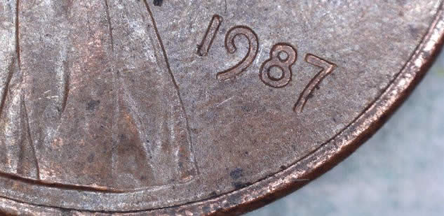 1987-Penny-Coin-Error--Bad-Strike--Silver-Tint