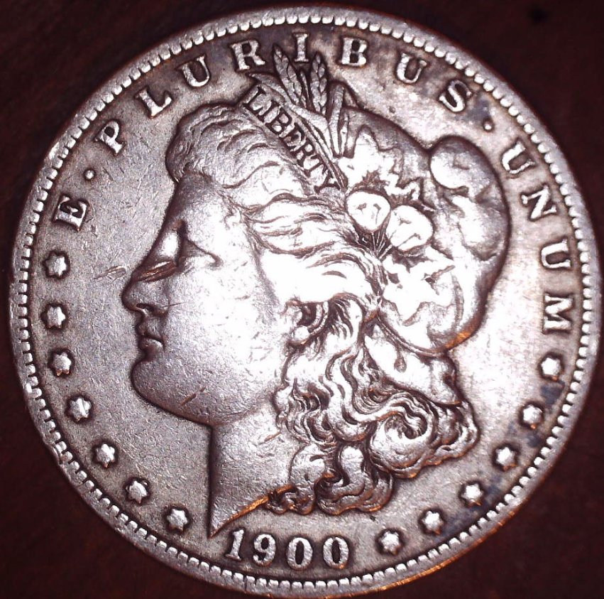 1900-Morgan$1-O/Cc-?-I-Think-It-Looks-1-Of-The-VAM-#'s7-12--Please-Advise