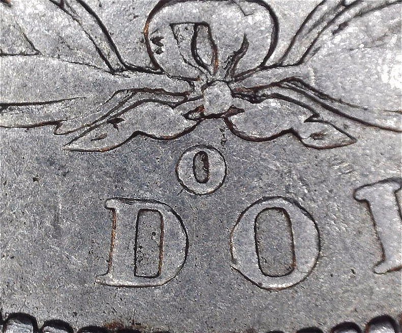 1889---O-Morgan-With-What-Looks-Like-A-Backwards-C-In-The-O-Mint-Stamp-Help
