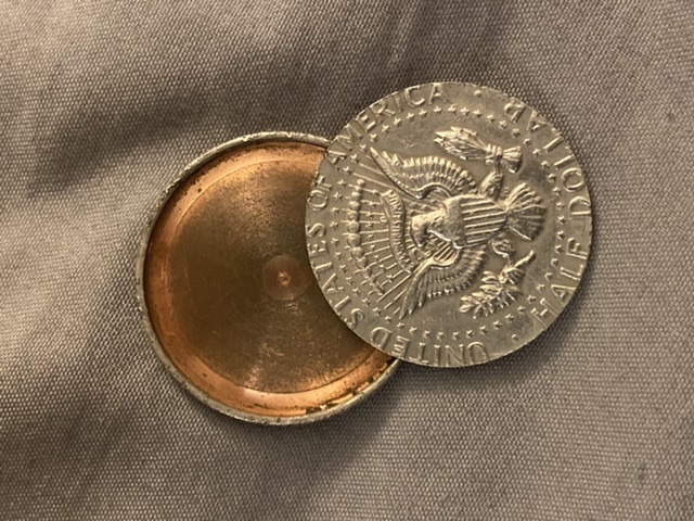 Half-Dollar/Peso-Coin-That-Opens-Id:-Magician's-Coin