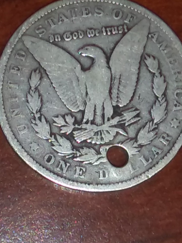 Are-These-US-Coins-Worthless-If-They-Have-A-Whole-Through-Them?