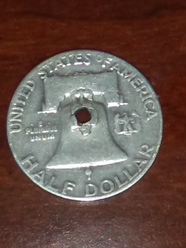 Are-These-US-Coins-Worthless-If-They-Have-A-Whole-Through-Them?