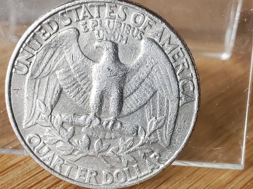 1989-P-Quarter-Reverse-'I'-In-'United'--Connected-To-Eagle-Wing;-Damage-Or-Error?