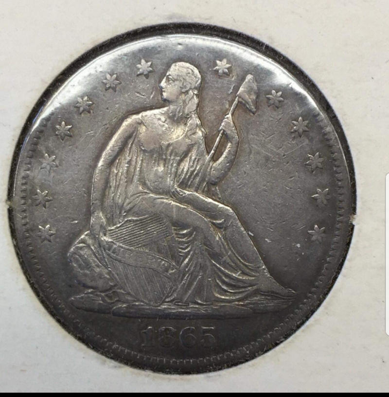 Has-This-1865-Seated-Lib-Half-Been-Cleaned