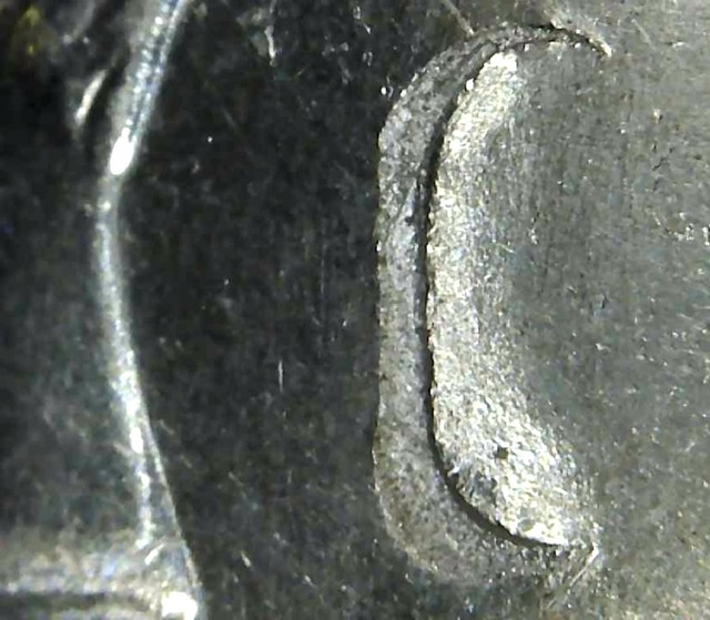 2004-D-Kennedy-Half---PMD,-Counterstamp-Or-Strike-Through?